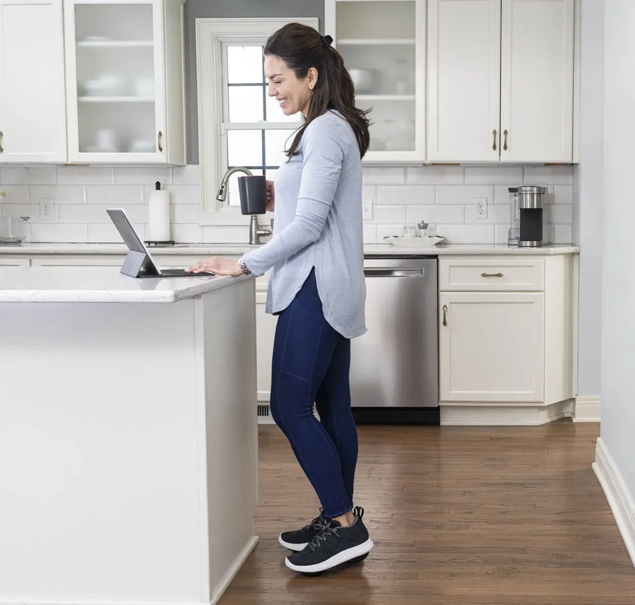 A woman moving comfortably at home